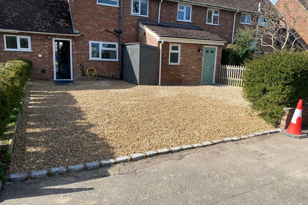 gravel driveway of domestic home terraced house